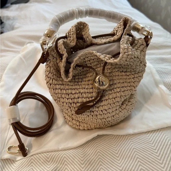Furla•NWT.  Woven Bucket Bag with Gold Details and Brown Leather Straps - Picture 2 of 2